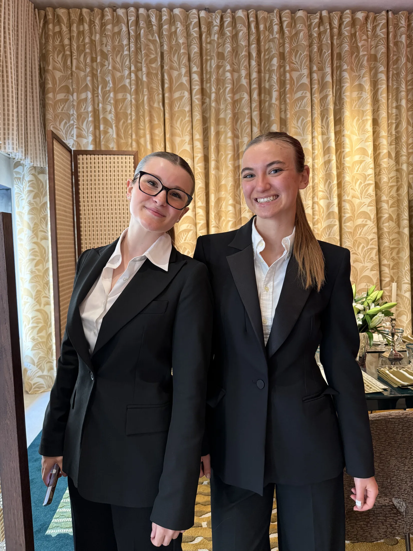 Two event hospitality professionals at an event in Milan